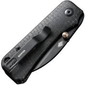 Baby Banter Wharncliffe Folding Knife displayed with black handle and Wharncliffe blade. A compact and reliable EDC tool for various tasks. 